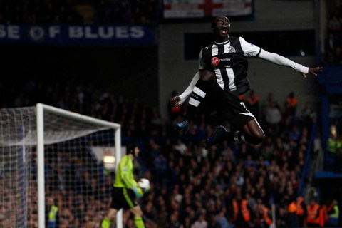 Newcastle United's Cisse celebrates after scoring against Chelsea during  their English Premier League soccer match at Stamford Bridge in London