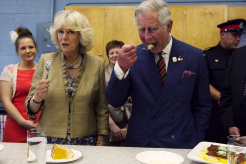 Britain's Prince Charles and Camilla, Duchess of Cornwall, taste maple cake during a visit to Hazen White-St. Francis school in Saint John