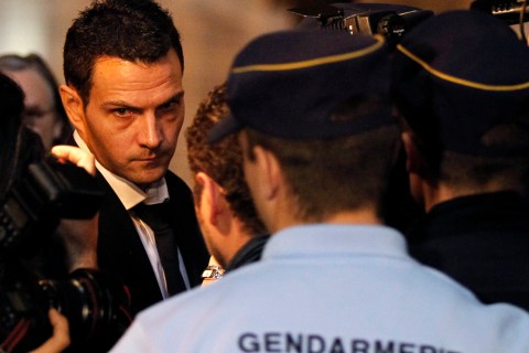 Former trader Jerome Kerviel arrives at Paris courts for the verdict in his trial to face charges of breach of trust, computer abuse and forgery