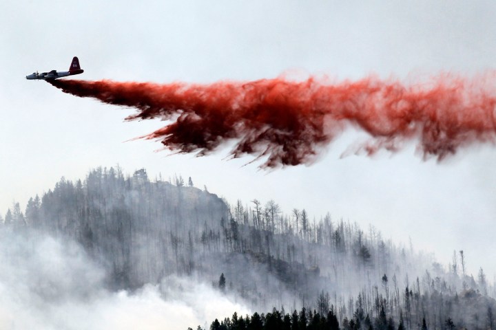 Heavy air tanker drops fire retardant on the High Park fire west of Fort Collins