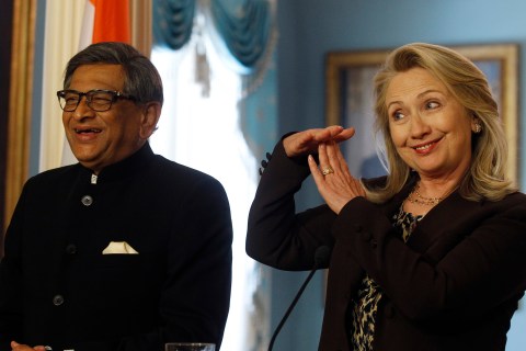 U.S. Secretary of State Clinton calls time-out during multiple question as India's Foreign Minister Krishna smiles during their news conference at U.S.-India Strategic Dialogue in Washington