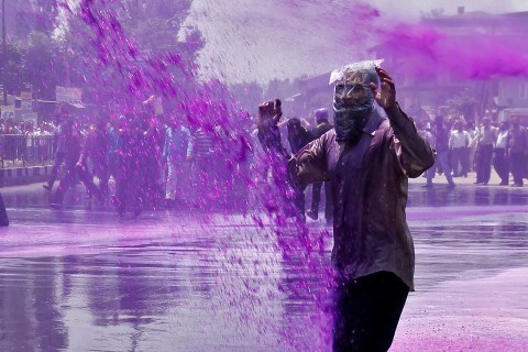 Indian dye water cannon protest