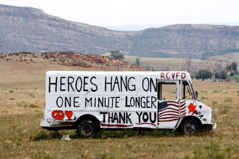 A message is painted on a truck near where the High Park fire has burned out, west of Fort Collins, in Colorado