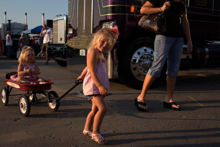 Young girls take part in the Iowa 80 truck stop's 33rd Annual Truckers Jamboree in Walcott, Iowa.