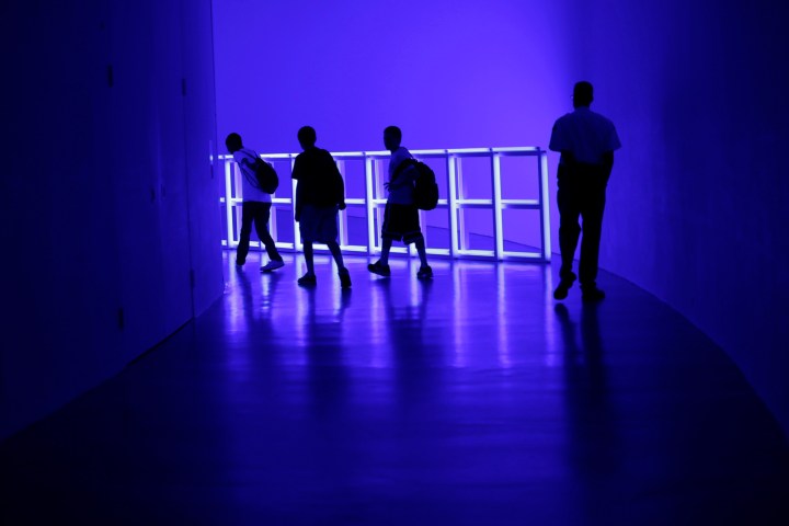 Visitors walk through an exhibit at the Smithsonian Institution's Hirshhorn Museum in Washington
