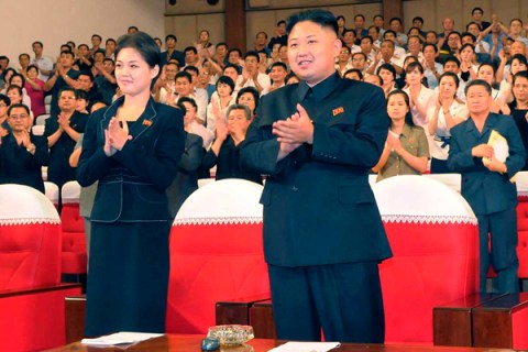 North Korean leader Kim applauds during a demonstration performance by the newly formed Moranbong band in Pyongyang