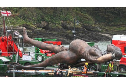 Damien Hirst's sculpture "Verity" being installed in Ilfracombe, UK.