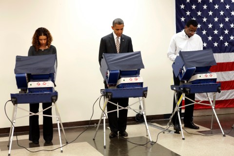 U.S. President Barack Obama casts his vote early at the Martin Luther King Community Center in Chicago