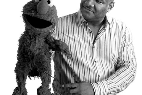image: Kevin Clash sits with Elmo during a photo shoot with TIME in Oct. 2011.