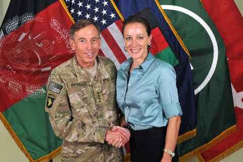 Handout photo of Commander of the International Security Assistance Force (ISAF)/U.S. Forces in Afghanistan General Petraeus shaking hands with author Broadwell