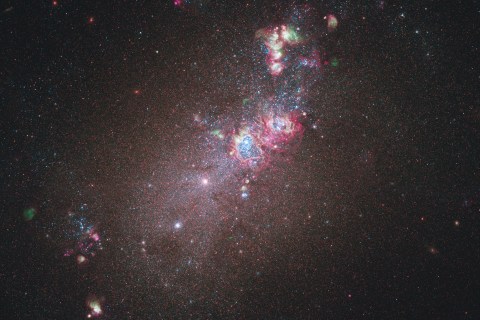 This full-field image of the nearby dwarf galaxy NGC 4214 taken with NASA's Hubble Space Telescope is shown as released by NASA
