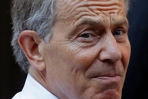 Former British Prime Minister Blair arrives before giving evidence before the Leveson Inquiry into the ethics and practices of the media at the High Court in central London