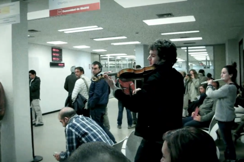 image: Spanish flash mob at unemployment office