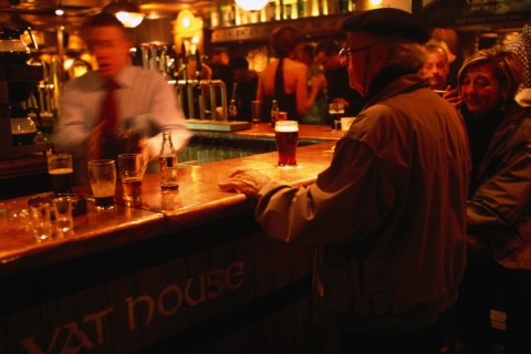 bar tender and customer, Dunlin, Ireland