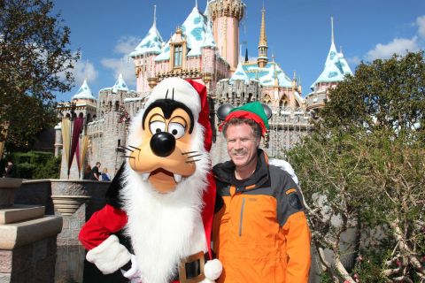 image: Actor Will Ferrell poses with Goofy in front of Disneyland in Anaheim, Calif. on November 9, 2012.