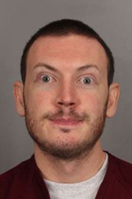 In this photo provided by the Arapahoe County Sheriff's Office, James Holmes poses for a booking photo September 20, 2012 in Centennial, Colorado.