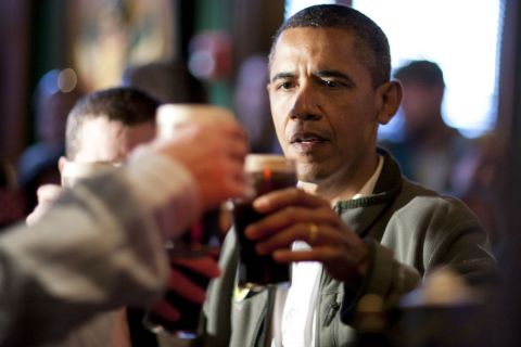 image: President Barack Obama toasts with Guinness beer on March 17, 2012 in Washington, DC in honor of St. Patrick's Day.
