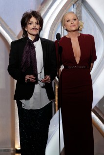 Hosts Tina Fey (L) and Amy Poehler on stage at the 70th annual Golden Globe Awards in Beverly Hills