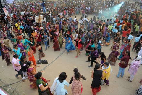 Participants dance during Ahmedabad Rising in support of the nation wide 'One Billion Rising India Campaign' in Ahmedabad on February 14, 2013. 