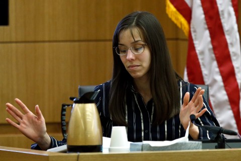 Jodi Arias gestures toward the jury as she speaks from the witness stand in Maricopa County Superior Court