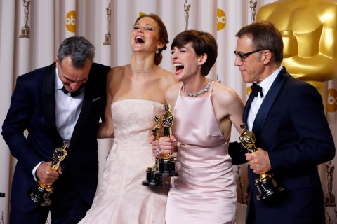 Day-Lewis, Lawrence, Hathaway and Waltz pose with their Oscars backstage at the 85th Academy Awards in Hollywood