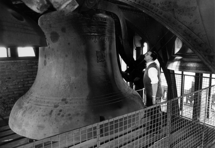 A maintenance man inspects the 16 and a half ton Big Ben bell, the world renowned landmark of London's Houses of Parliament clock, March 20, 1971.