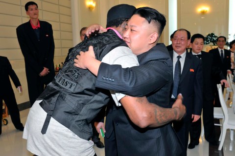 North Korean leader Kim Jong-Un and former NBA basketball player Dennis Rodman hug in Pyongyang