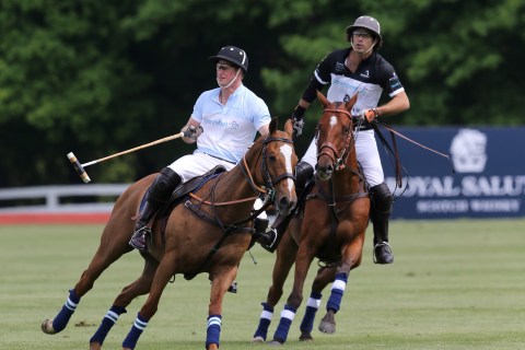 From left: Prince Harry and Nacho Figueras compete at the Greenwich Polo Club  at the Sentebale Royal Salute Polo Cup, in Greenwich, Conn., on May 15, 2013.