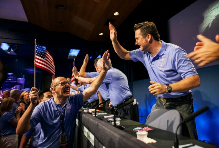 From left: Miguel San Martin, Chief Engineer, and Adam Steltzner celebrate the successful landing of Curiosity rover on the surface of Mars at NASA's Jet Propulsion Laboratory in Pasadena, Calif., on Aug. 5, 2012.