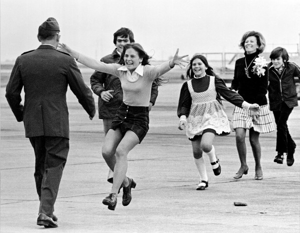 From left: Released prisoner of war Lt. Col. Robert L. Stirm is greeted by his family at Travis Air Force Base in Fairfield, Calif., as he returns home from the Vietnam War, on March 17, 1973. 