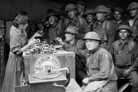 The Salvation Army distributes doughnuts to WWI soldiers on the front