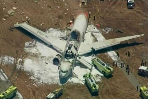An Asiana Airlines Boeing 777 is pictured after it crashed while landing in this KTVU image at San Francisco International Airport in California, July 6, 2013.    