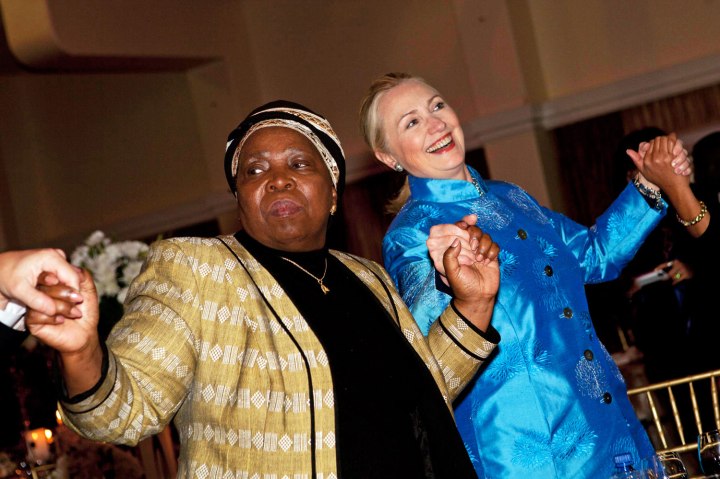 From left: African Union Chair-Designate Nkosazana Dlamini-Zuma and Former U.S. Secretary of State Hillary Rodham Clinton dance during a gala dinner at Sefako M. Makgatho Presidential Guest House in Pretoria, South Africa, on Aug. 7, 2007.