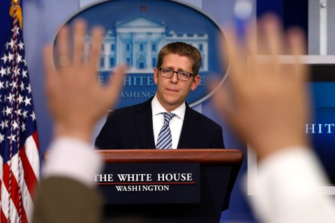 White House press secretary Carney is questioned by the press during the daily briefing at the White House in Washington