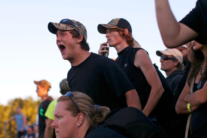 Spectators cheer during a heat Nation-Wide Demolition Derby  at the New Jersey State Fair Sussex County Farm and Horse Show in Augusta, N.J., on Aug. 4, 2013.