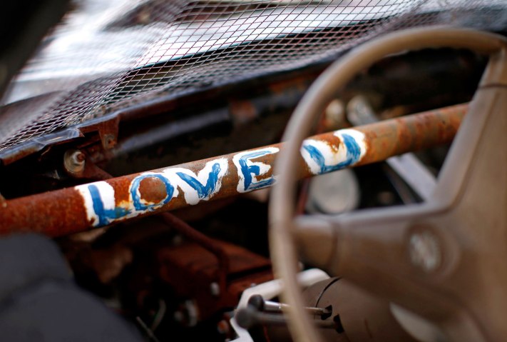 A message on the rusted interior of a car competing in the Nation-Wide Demolition Derby in Augusta, N.J., on Aug. 5, 2013. 