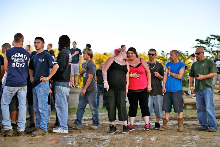 Spectators wait for a heat to begin at the Nation-Wide Demolition Derby in Augusta, N.J., on Aug. 4, 2013. 