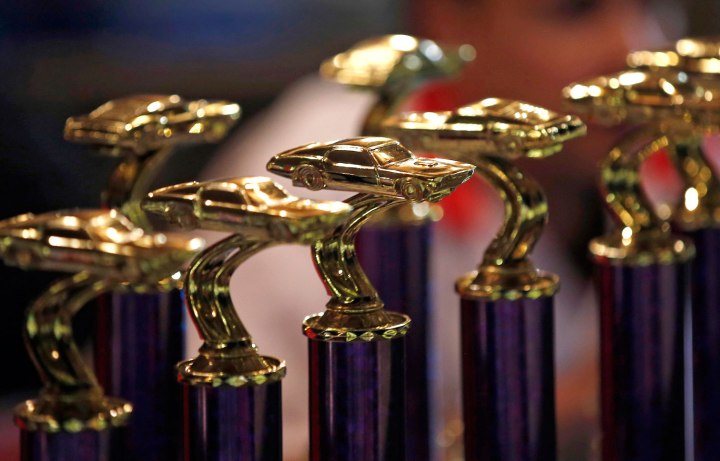 Trophies are lined up at the Nation-Wide Demolition Derby in Augusta, N.J., on Aug. 5, 2013. 