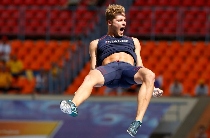 Kevin Mayer of France celebrates after clearing the bar at the men's decathalone pole vault event during the IAAF World Athletics Championships at the Luzhniki stadium in Moscow, on Aug. 11, 2013.