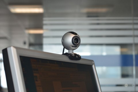 This photo shows a webcam on top of a co