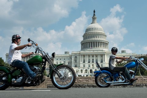 Bikers ride past the US Capitol Building September 11, 2013 in Washington, DC. Motorcyclists rode in and around DC to commemorate the 12th anniversary of the September 11 terrorist attacks on the United States. 