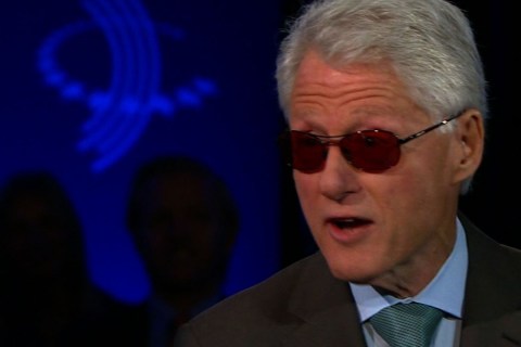 Clinton Does Bono Impersonation