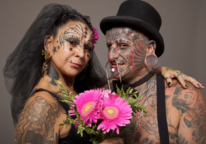 THE MOST BODY MODIFICATIONS COUPLE