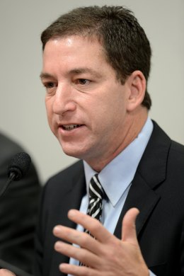 The Guardian's Brazil-based reporter Glenn Greenwald testifies before the investigative committee of the Senate that examines charges of espionage by the United States in Brasilia on October 9, 2013.