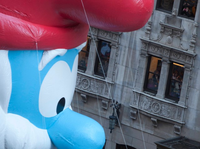 The Papa Smurf float makes its way down 6th Ave. during the 87th Macy's Thanksgiving day parade in New York