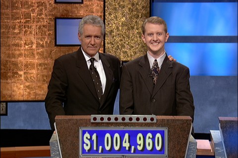 From left: Jeopardy host Alex Trebek and contestant Ken Jennings after his earnings from his record breaking streak on the gameshow surpassed 1 million dollars, on July 14, 2004 in Culver City, Calif.